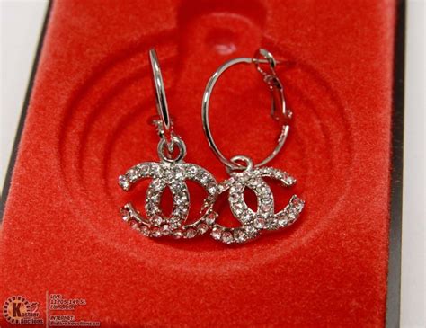 fake silver chanel earrings|replica chanel earrings.